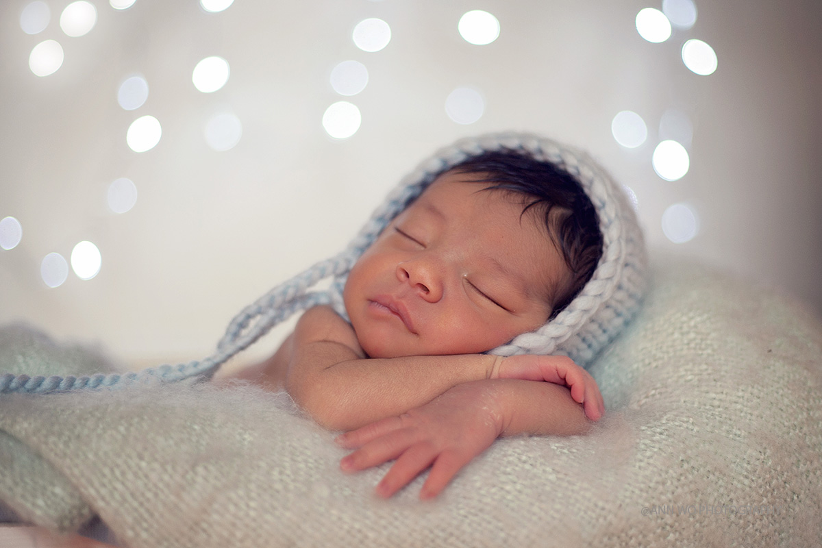 newborn photography ann wo london baby boy blue hat christmas
